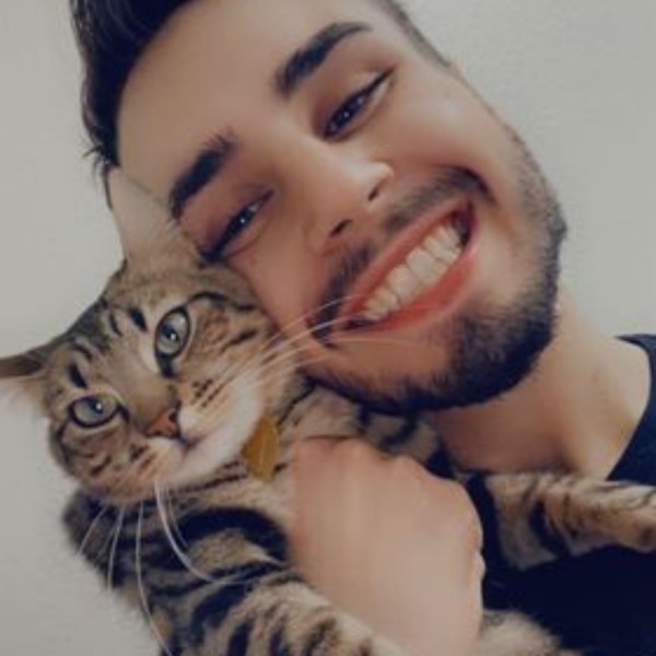 Kimora the cat and male owner